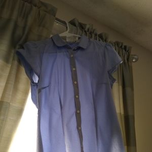 A blue shirt-sleeve blouse